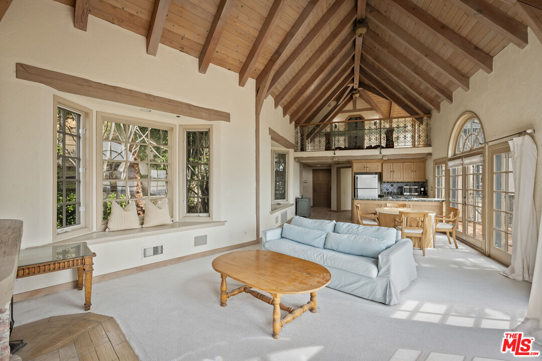 1041 Somera Road Los Angeles, CA 90077 - Photo 32 of 40 a living room with furniture and a large window