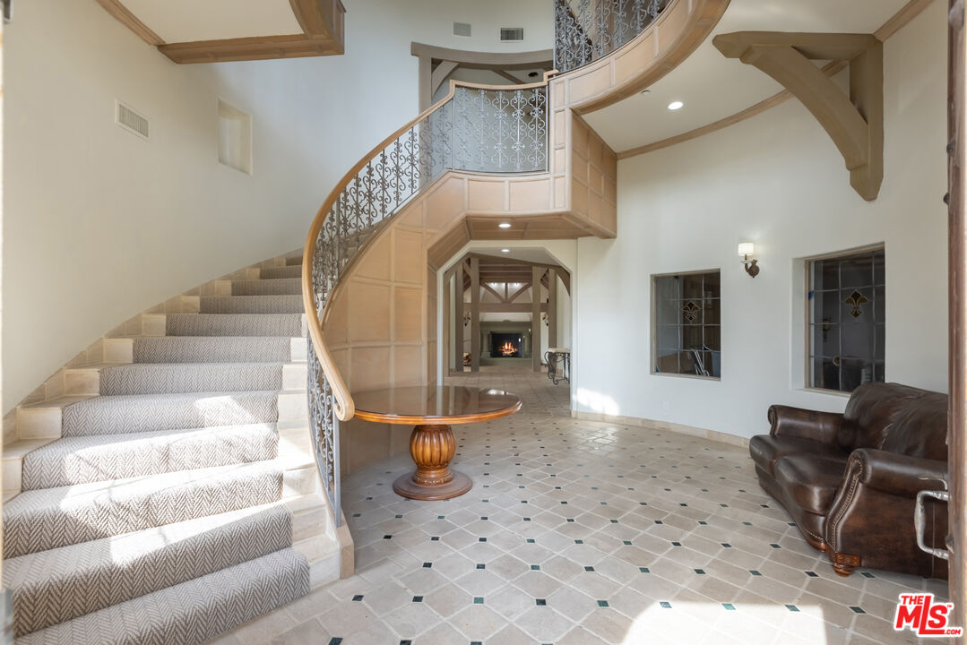 1041 Somera Road Los Angeles, CA 90077 - Photo 5 of 40 a view of entryway and hall with wooden floor