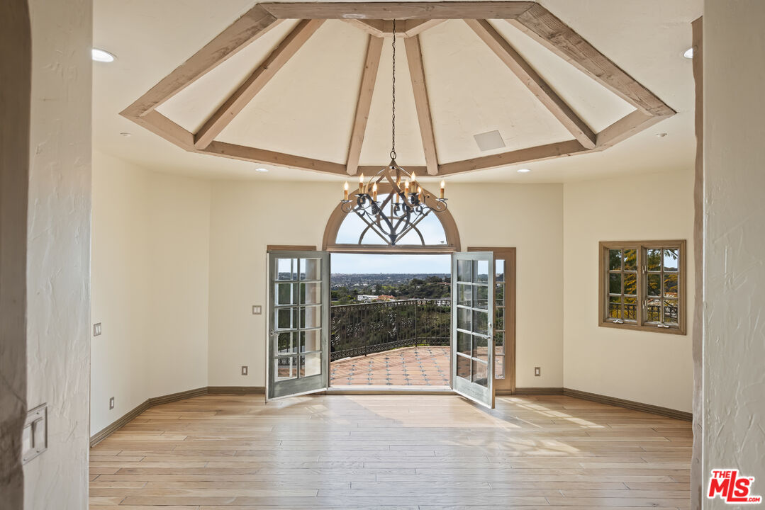 1041 Somera Road Los Angeles, CA 90077 - Photo 10 of 40 a view of an empty room with a window
