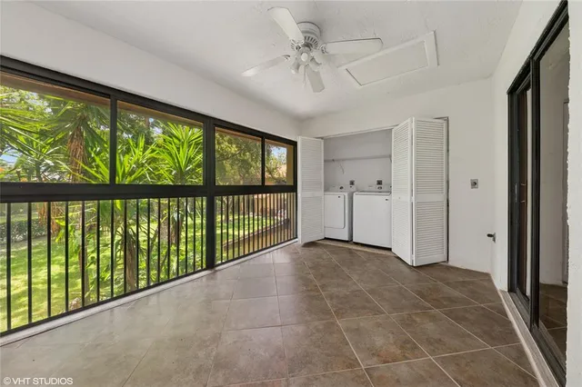 a view of an empty room with a sliding door