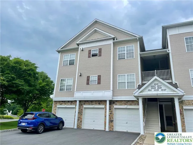 a car parked in front of a house