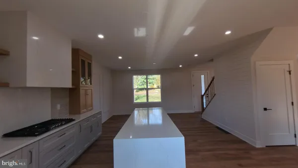 a kitchen with sink and window