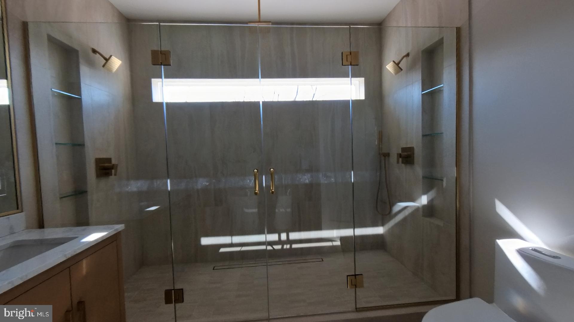 106 Maron Road Hatfield, PA 19440 - Photo 22 of 37 Sleek glass shower with modern elegance.
