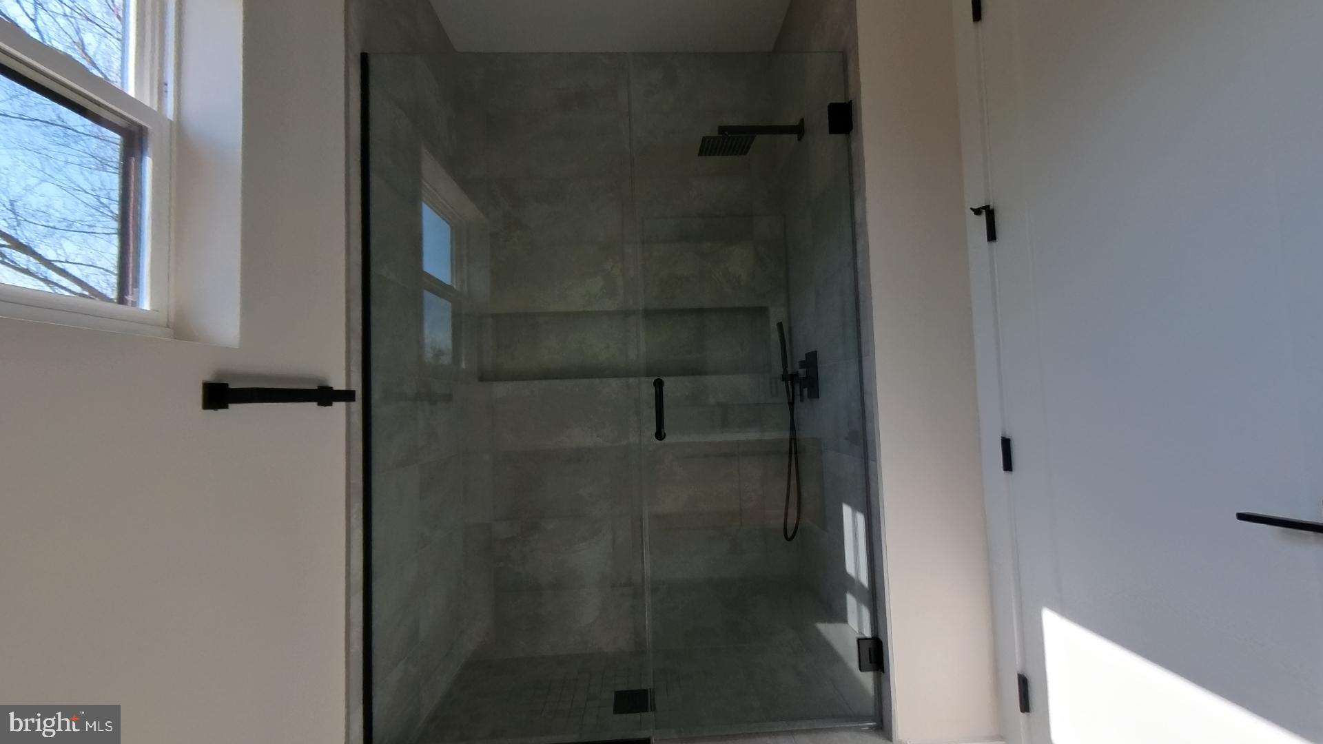 106 Maron Road Hatfield, PA 19440 - Photo 27 of 37 Sleek modern shower with natural light.