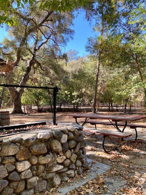 47575 Arroyo Seco Road, Unit 53 Greenfield, CA 93927 - Photo 12 of 21 a picture of street with lots of trees