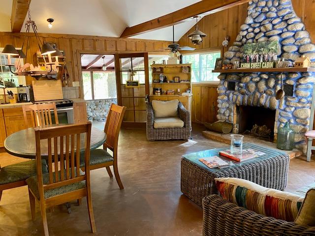 47575 Arroyo Seco Road, Unit 53 Greenfield, CA 93927 - Photo 2 of 21 a living room with furniture and a fireplace