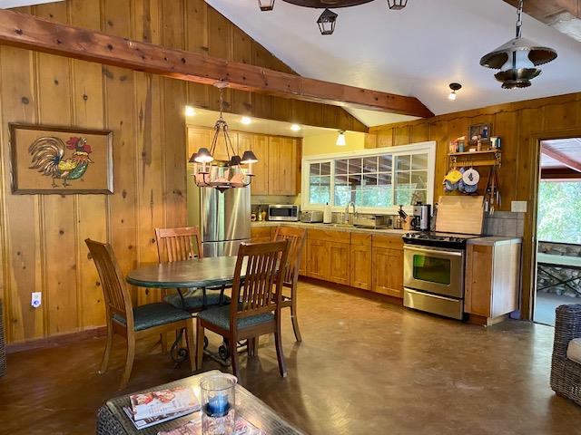 47575 Arroyo Seco Road, Unit 53 Greenfield, CA 93927 - Photo 5 of 21 a view of a dining room with furniture and wooden floor