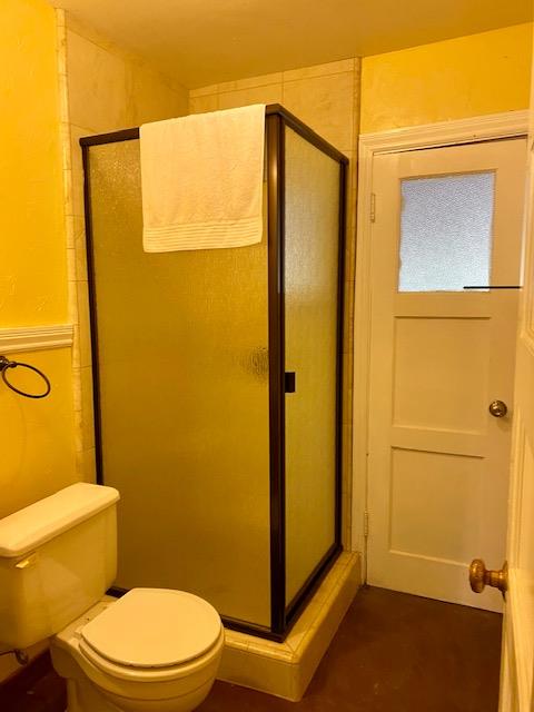 47575 Arroyo Seco Road, Unit 53 Greenfield, CA 93927 - Photo 9 of 21 a bathroom with a toilet and shower