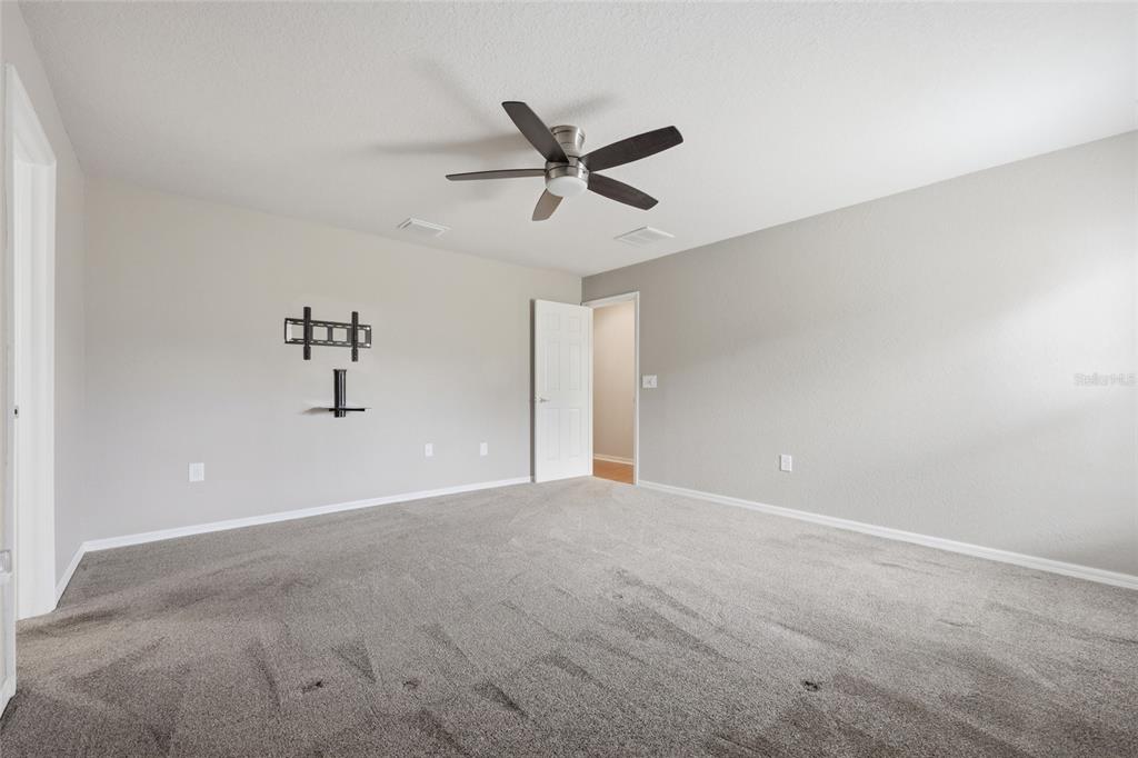 306 Stone Point Lane Lady Lake, FL 32159 - Photo 23 of 39 a view of an empty room