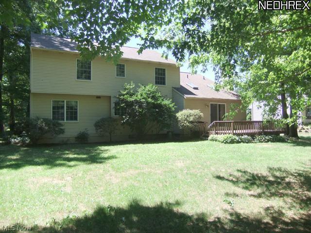 4601 Pinewood Path Akron, OH 44321 - Photo 21 of 23 Step outside to the back of the home.