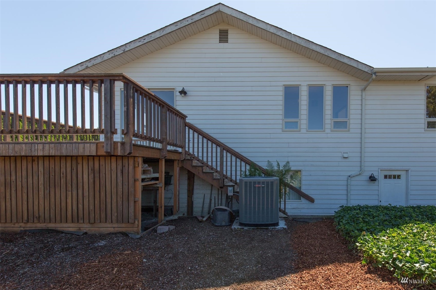 308 Eunice Street Sequim, WA 98382 - Photo 12 of 38 a view of a house with wooden fence