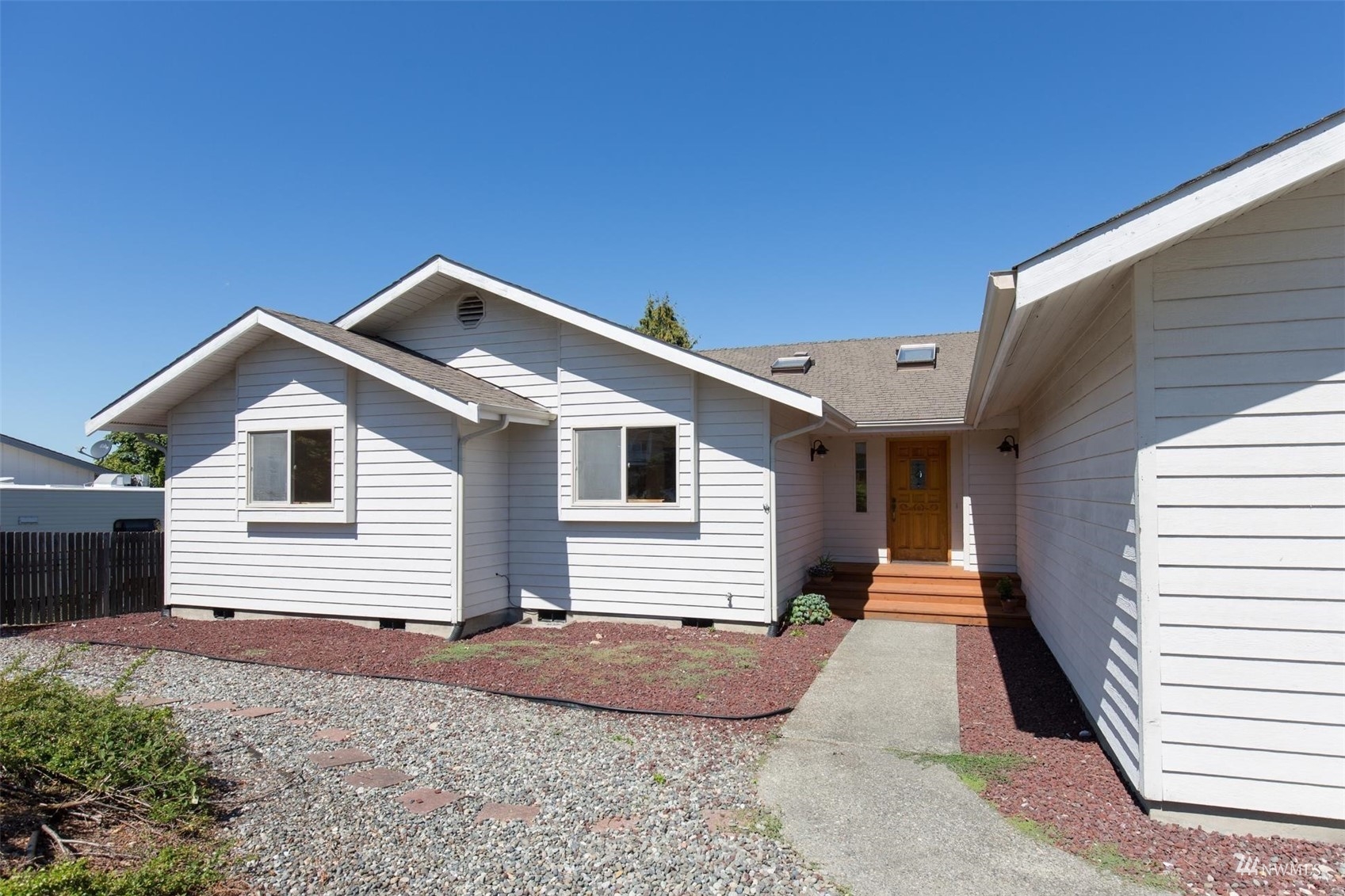 308 Eunice Street Sequim, WA 98382 - Photo 2 of 38 a front view of house with yard