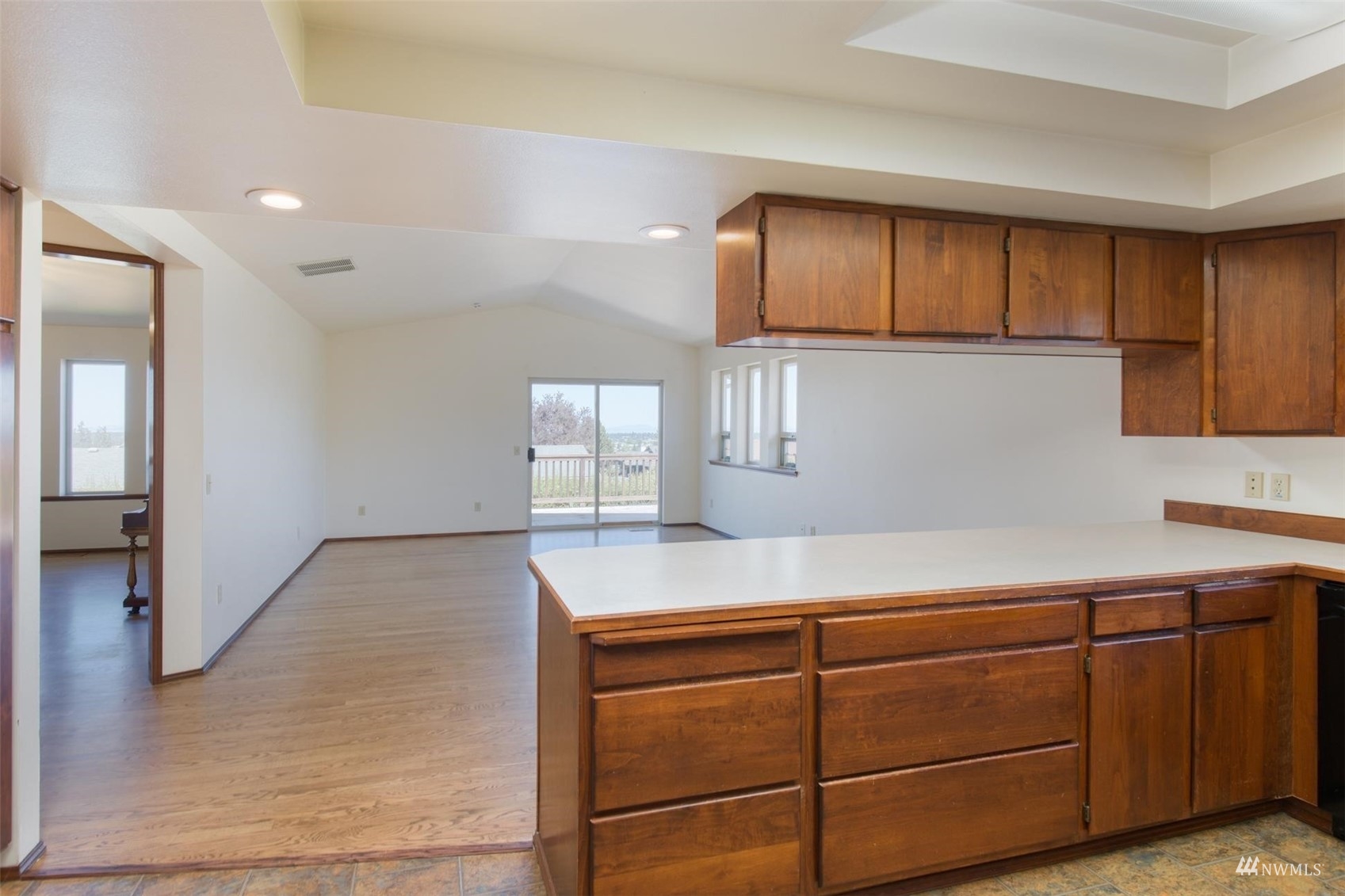 308 Eunice Street Sequim, WA 98382 - Photo 25 of 38 a kitchen with cabinets and window