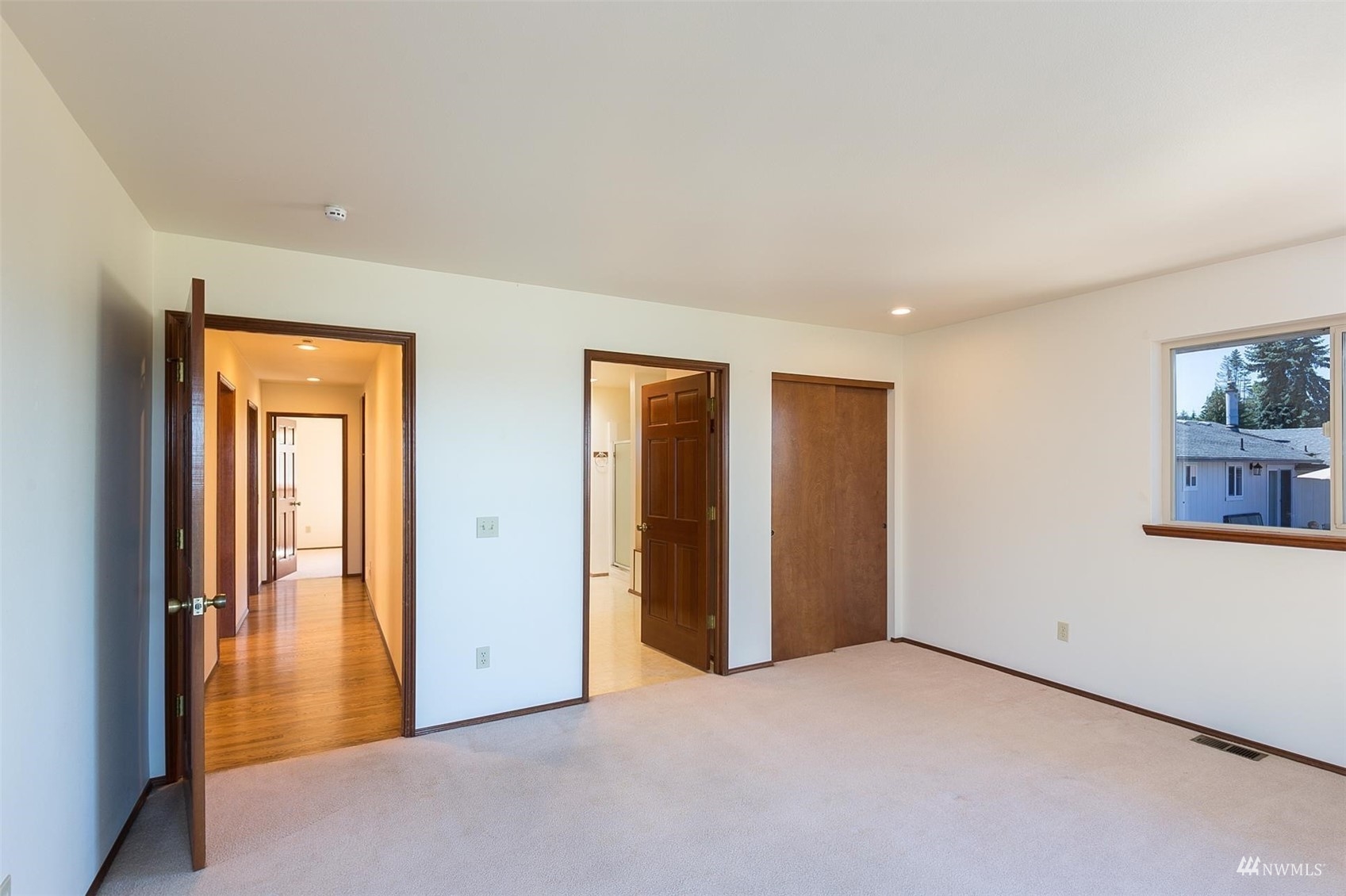 308 Eunice Street Sequim, WA 98382 - Photo 28 of 38 an empty room with windows and closet