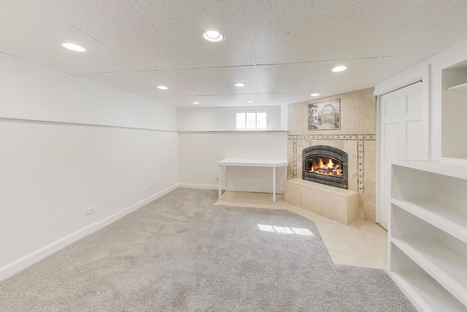 421 East Indiana Street Wheaton, IL 60187 - Photo 17 of 37 a view of a livingroom with a fireplace