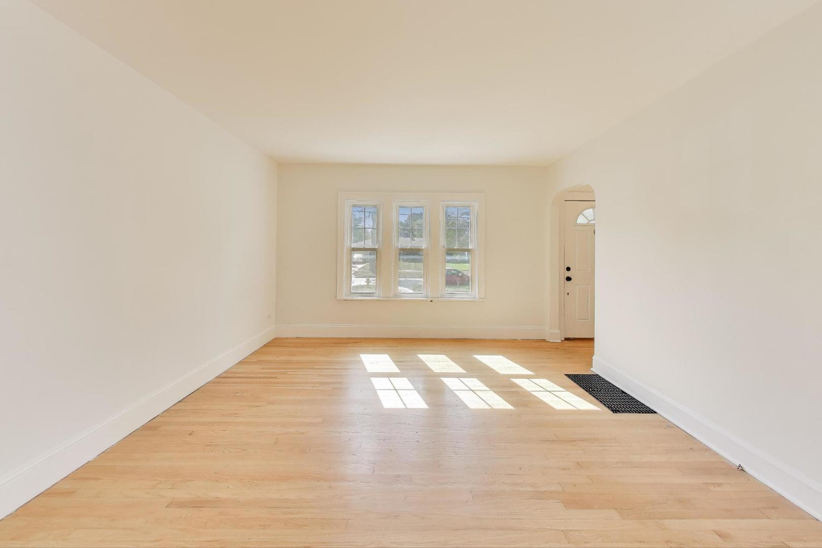 421 East Indiana Street Wheaton, IL 60187 - Photo 4 of 37 a view of an empty room and window