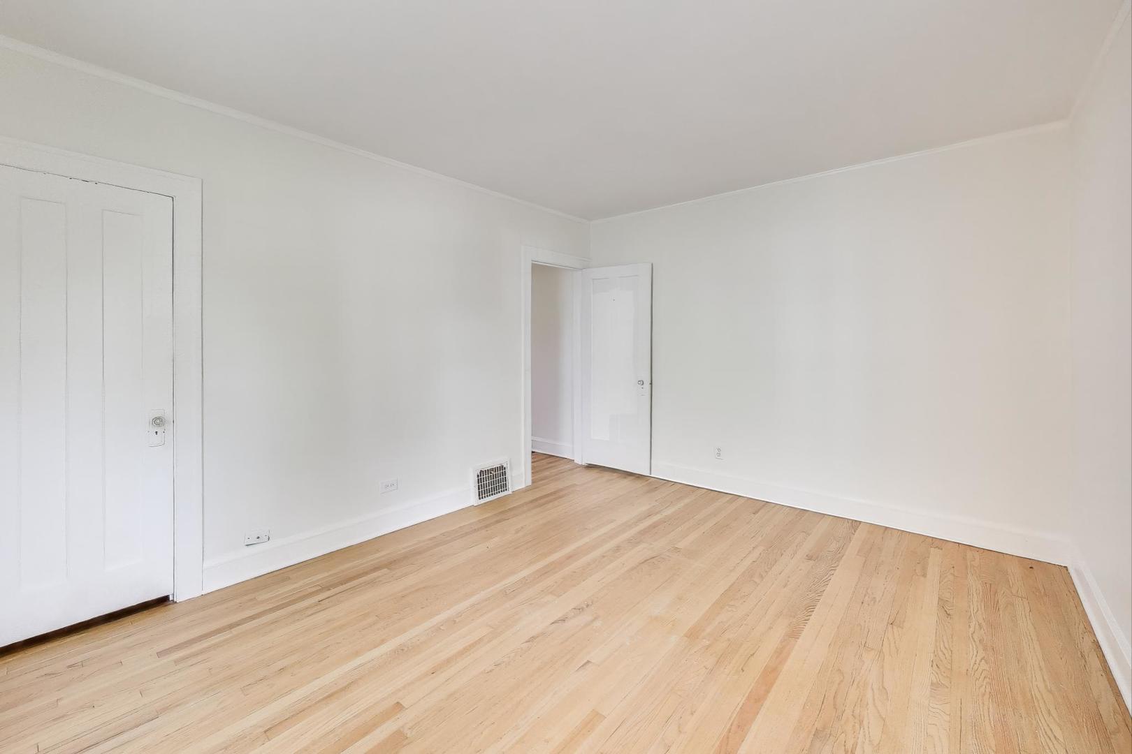 421 East Indiana Street Wheaton, IL 60187 - Photo 10 of 37 a view of empty room with wooden floor