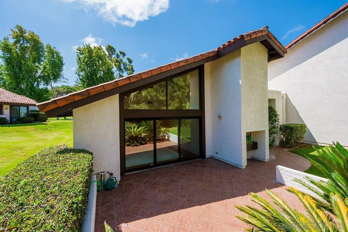 1332 Sun Valley Road Solana Beach, CA 92075 - Photo 17 of 38 a front view of a house with garden
