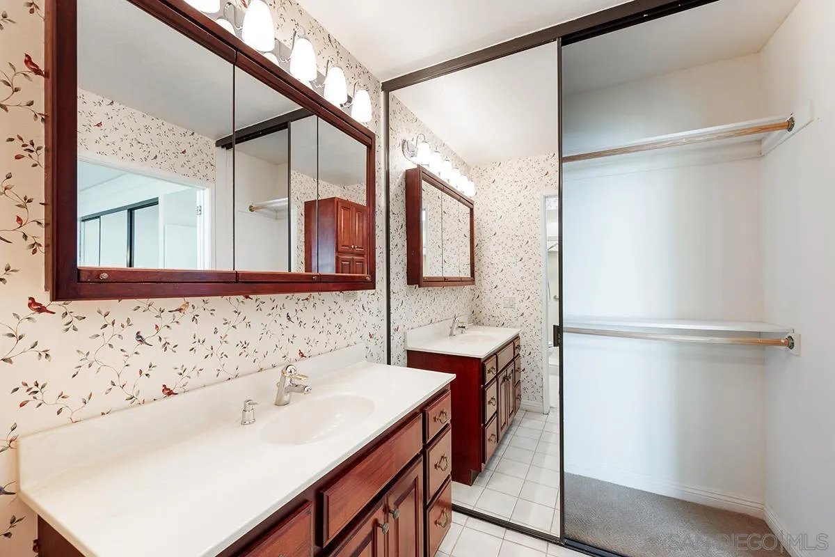 1332 Sun Valley Road Solana Beach, CA 92075 - Photo 25 of 38 a bathroom with a sink and a mirror