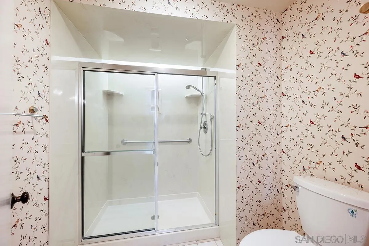 1332 Sun Valley Road Solana Beach, CA 92075 - Photo 27 of 38 a bathroom with a shower and a toilet