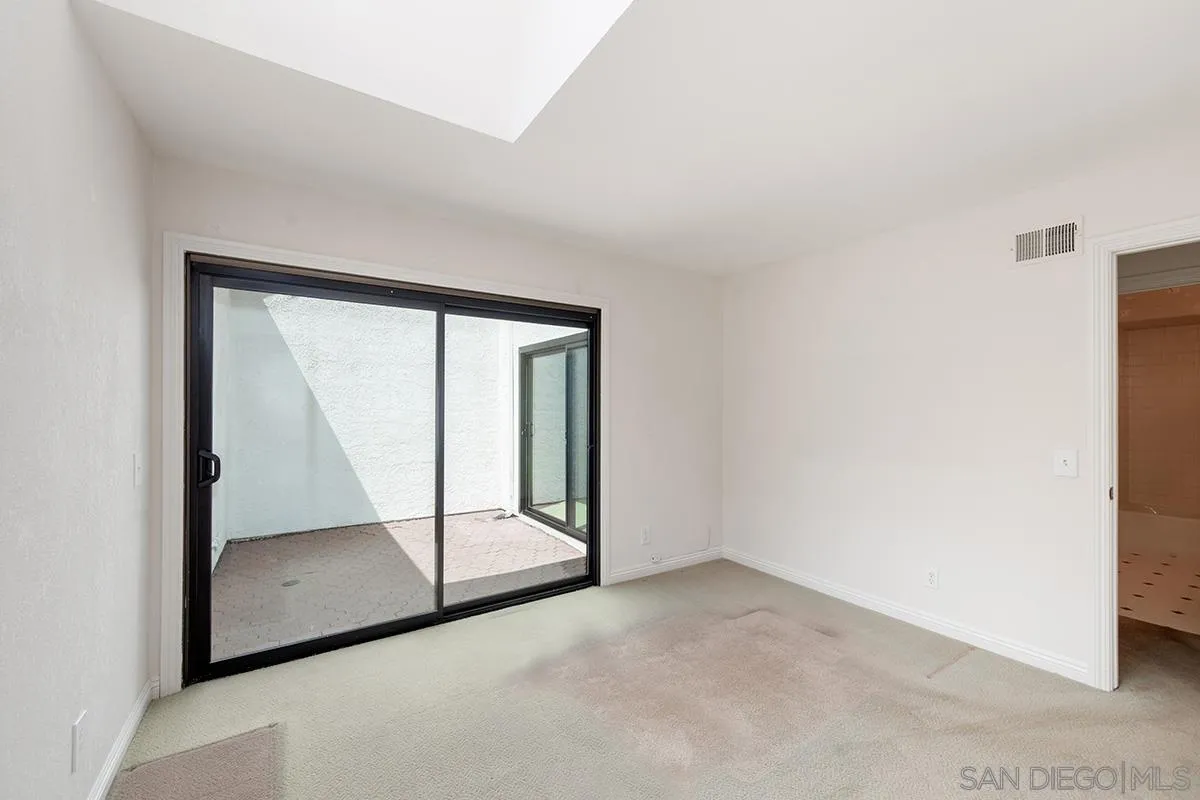 1332 Sun Valley Road Solana Beach, CA 92075 - Photo 31 of 38 a view of an empty room with a window