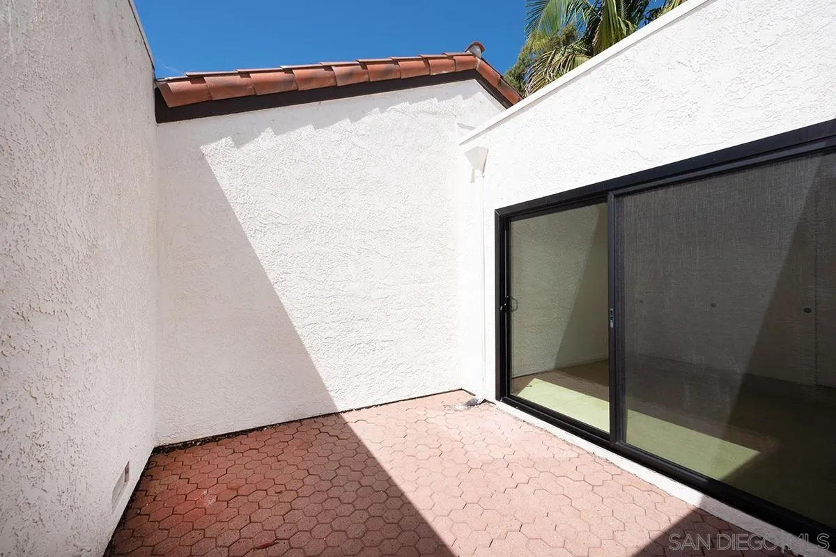 1332 Sun Valley Road Solana Beach, CA 92075 - Photo 32 of 38 a view of a big room with wooden floor and windows