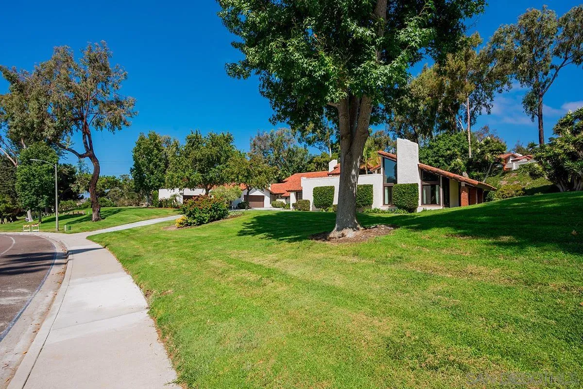 1332 Sun Valley Road Solana Beach, CA 92075 - Photo 4 of 38 a front view of a house with garden
