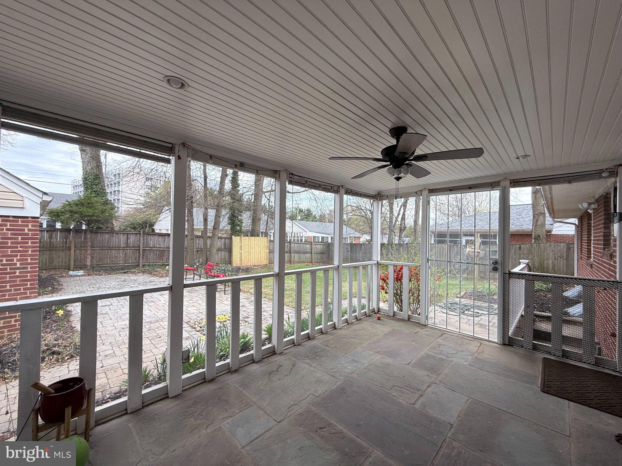 9709 Saxony Road Silver Spring, MD 20910 - Photo 43 of 47 a view of a porch with wooden floor