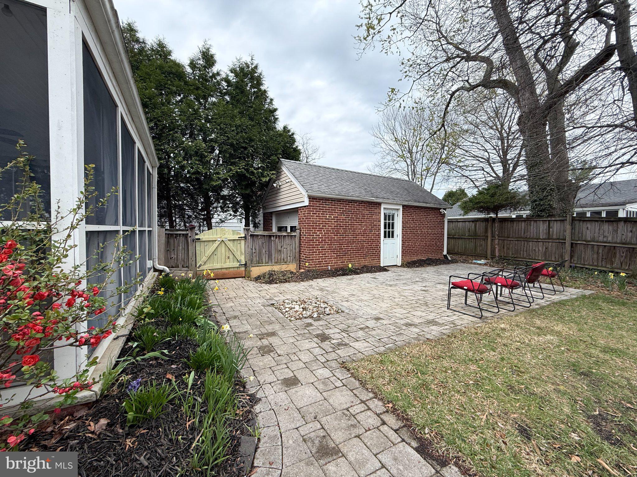 9709 Saxony Road Silver Spring, MD 20910 - Photo 44 of 47 a view of backyard with table and chairs and potted plants