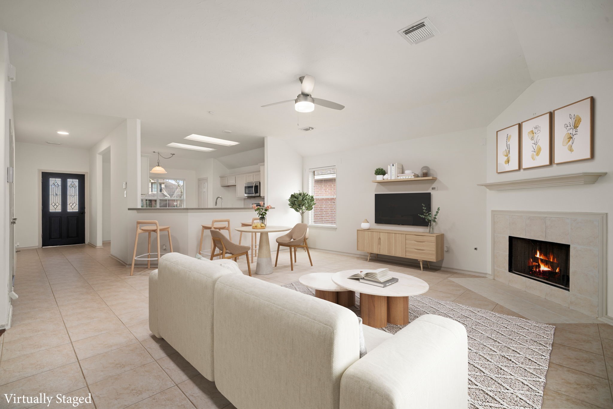 13410 Baron Hill Lane Rosharon, TX 77583 - Photo 16 of 40 a living room with furniture a fireplace and a flat screen tv