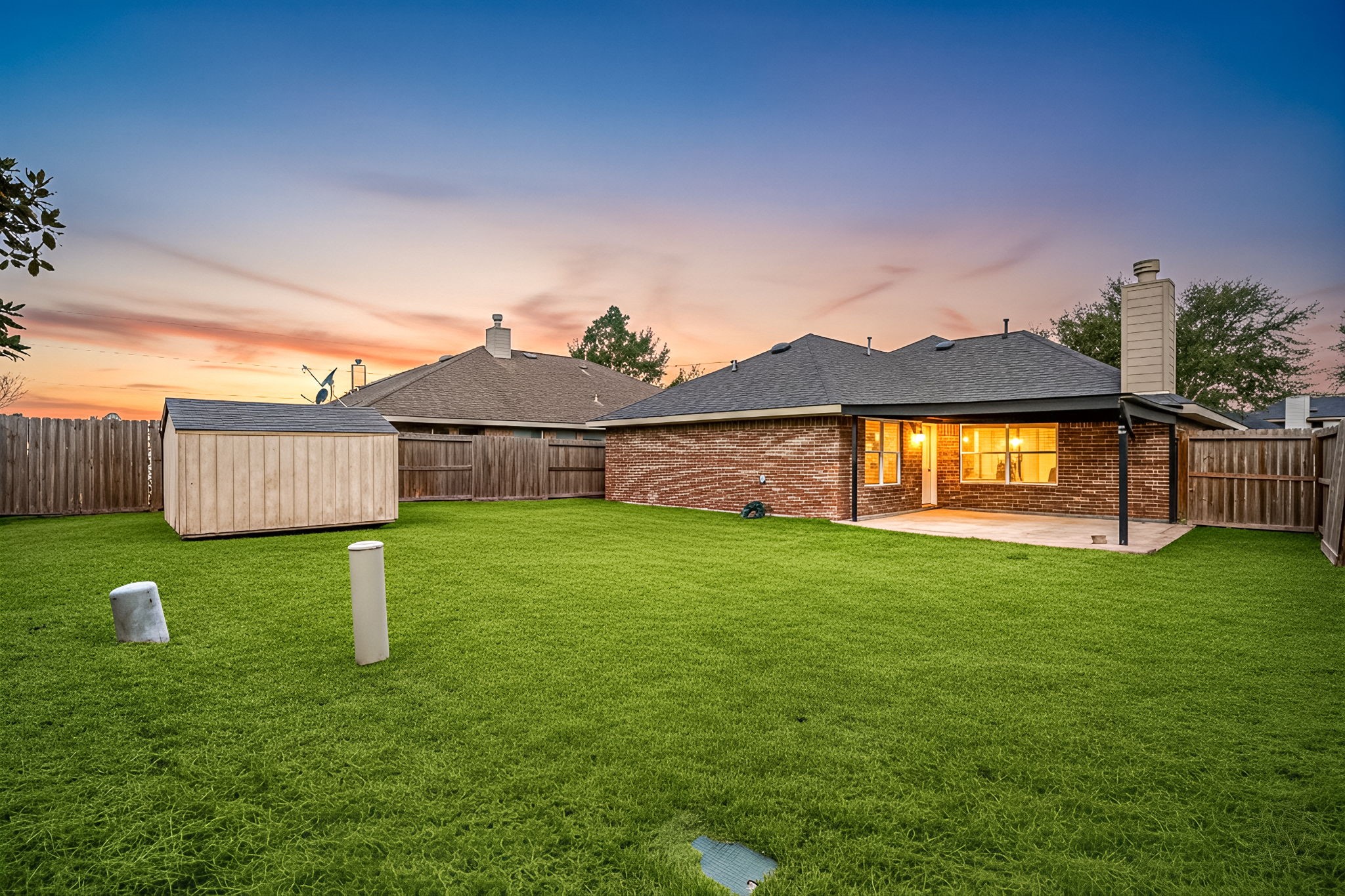 13410 Baron Hill Lane Rosharon, TX 77583 - Photo 2 of 40 a view of a house with a backyard