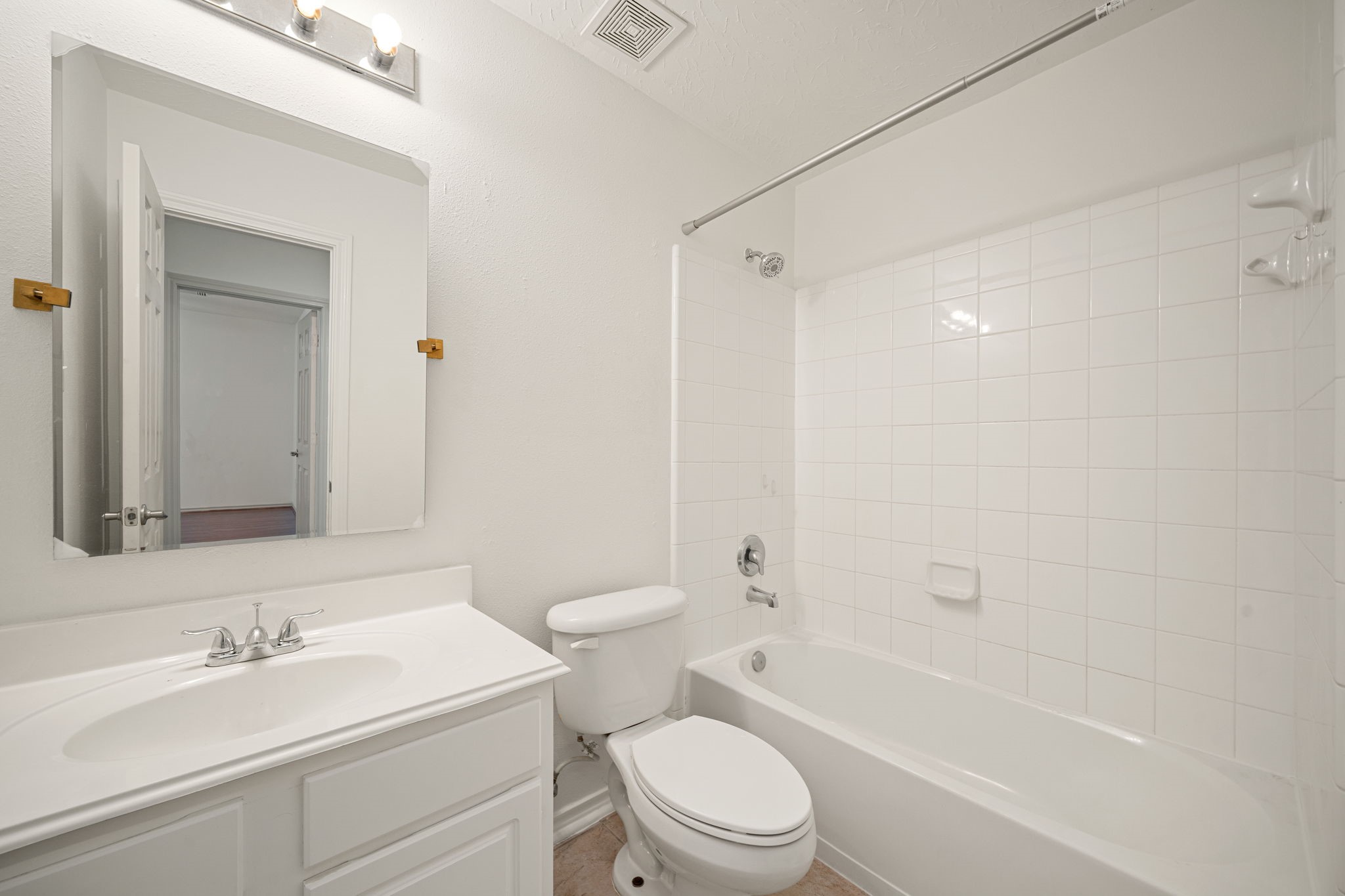 13410 Baron Hill Lane Rosharon, TX 77583 - Photo 27 of 40 a bathroom with a sink a toilet and shower