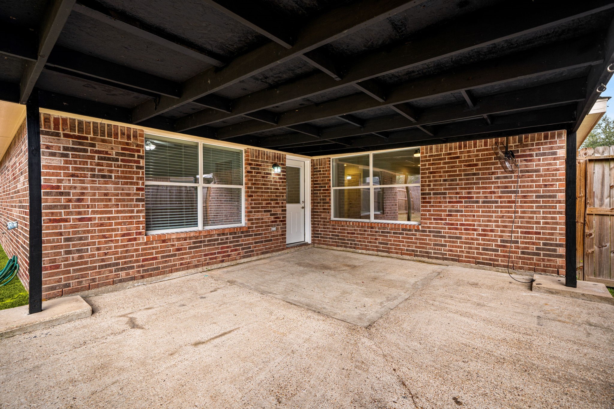 13410 Baron Hill Lane Rosharon, TX 77583 - Photo 32 of 40 a view of a house with wooden walls