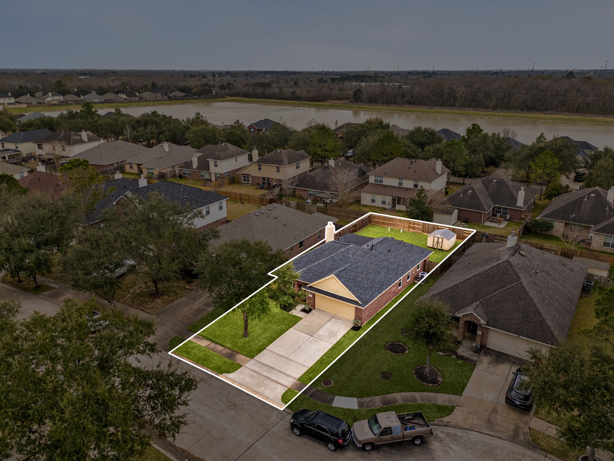 13410 Baron Hill Lane Rosharon, TX 77583 - Photo 38 of 40 an aerial view of a house with a lake view