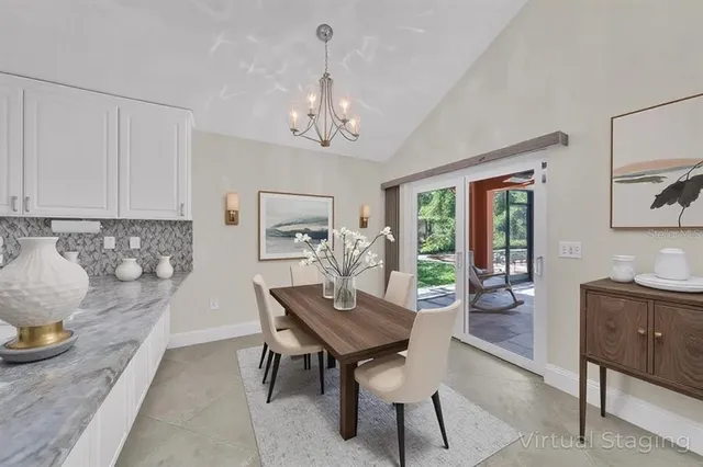 a bedroom with a large bed and a couch