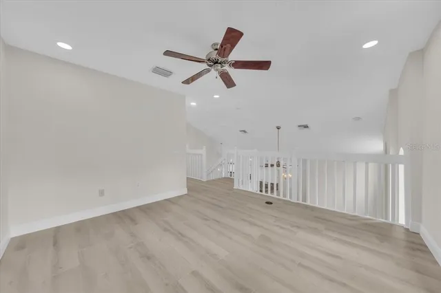 a white bath tub sitting in a bathroom