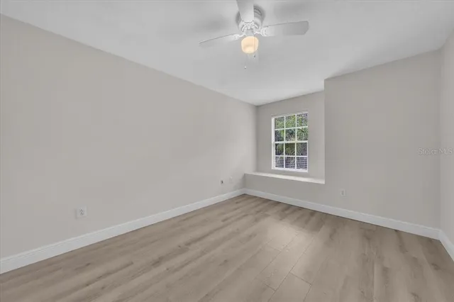 a patio with yard and outdoor seating
