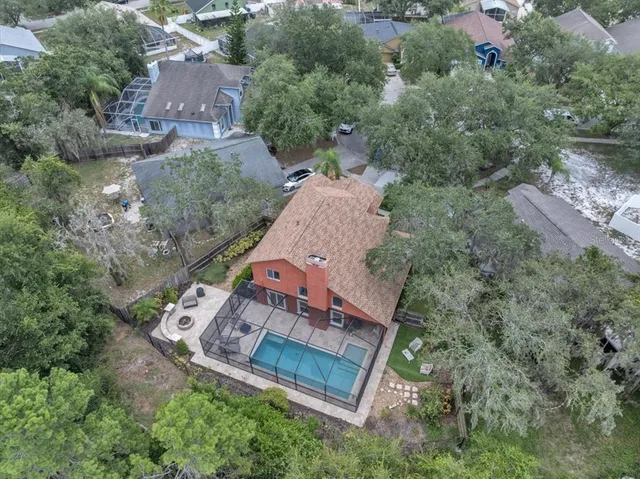 a living room with fireplace furniture and a flat screen tv