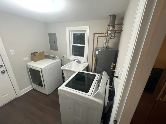 a utility room with dryer and washer