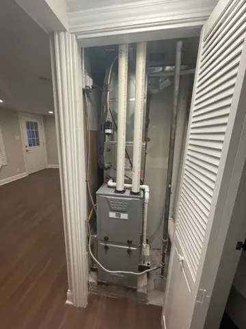 an entryway with wooden floor