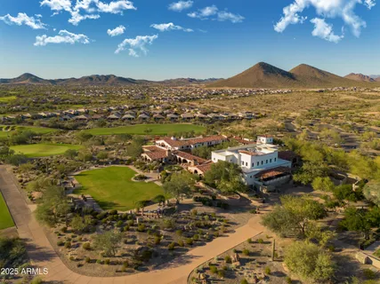 a view of a city with mountains in the background