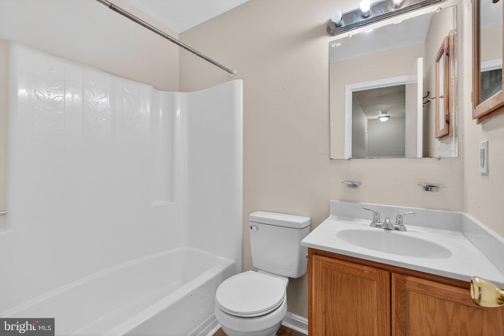 3362 Ryon Court Waldorf, MD 20601 - Photo 27 of 42 a bathroom with a sink toilet and shower