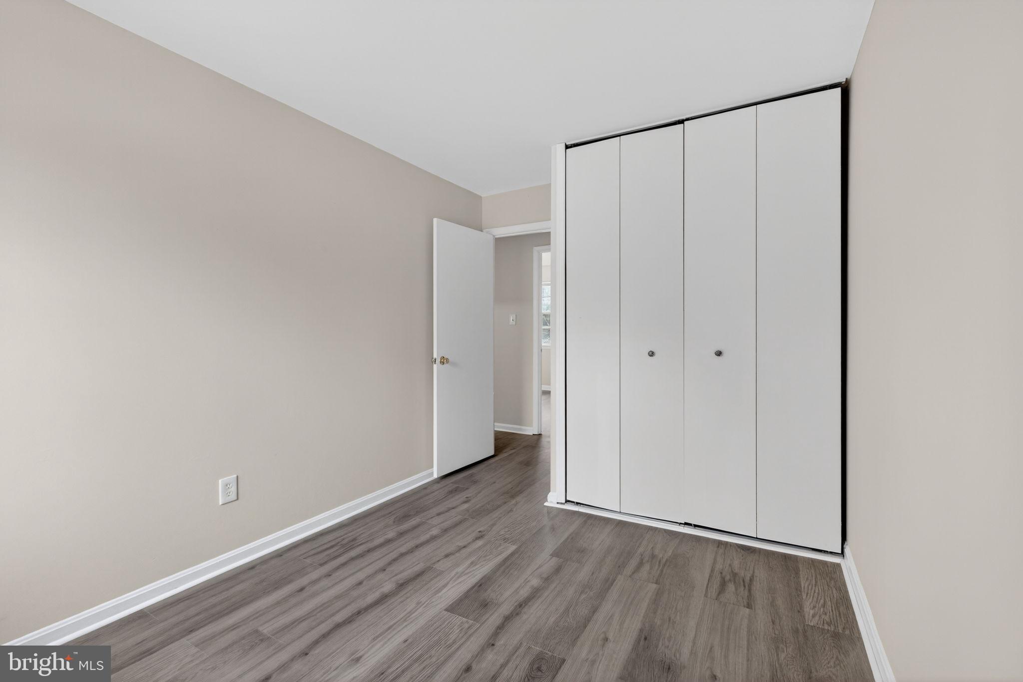 3362 Ryon Court Waldorf, MD 20601 - Photo 30 of 42 a view of an empty room with wooden floor