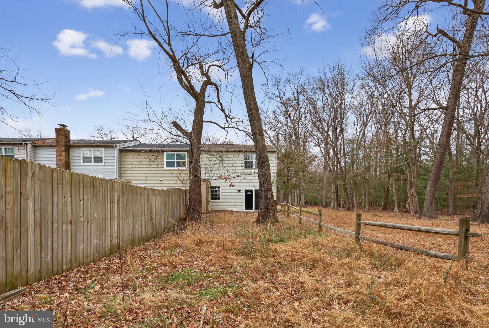 3362 Ryon Court Waldorf, MD 20601 - Photo 36 of 42 a view of a backyard with wooden fence