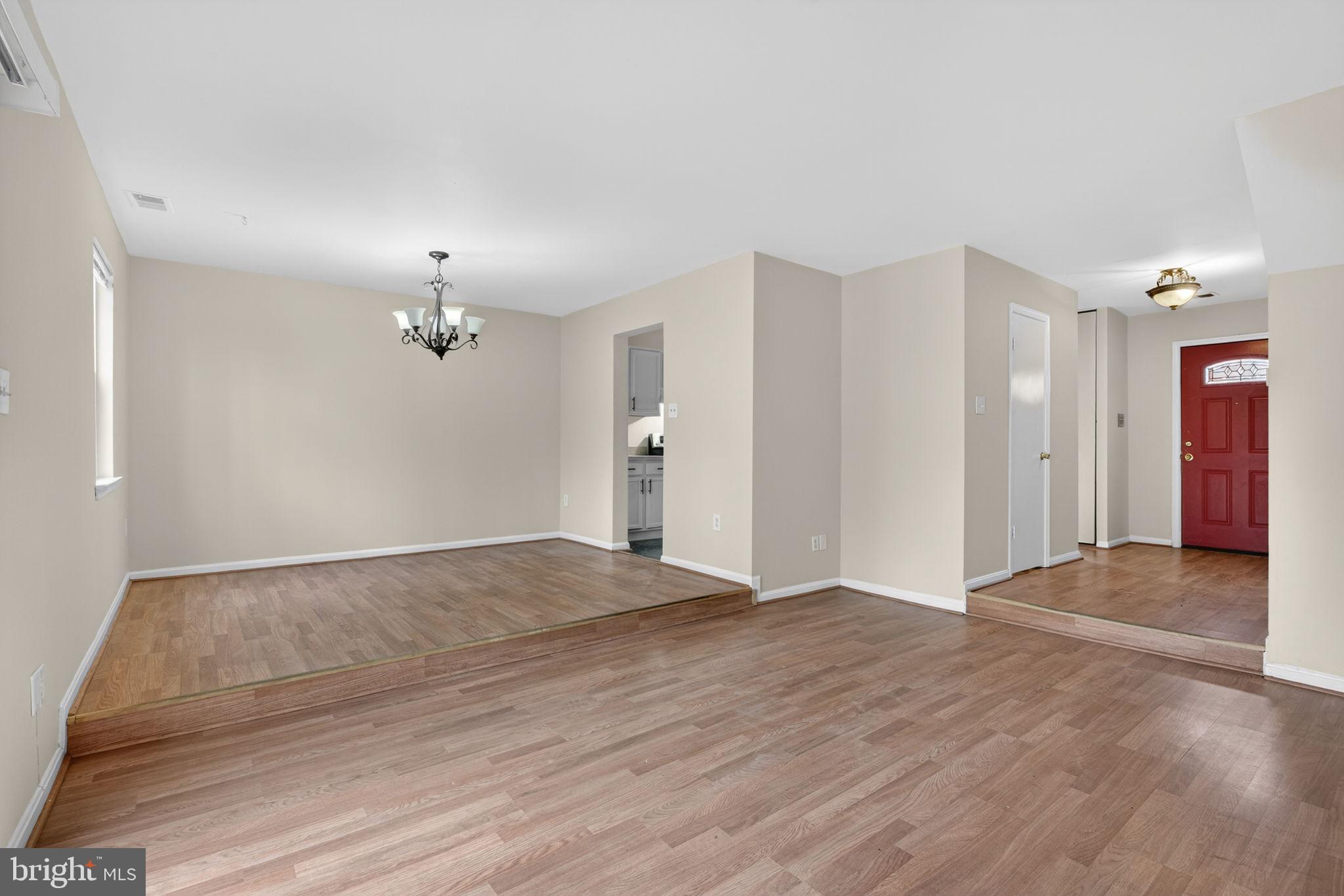 3362 Ryon Court Waldorf, MD 20601 - Photo 9 of 42 wooden floor in an empty room with a window