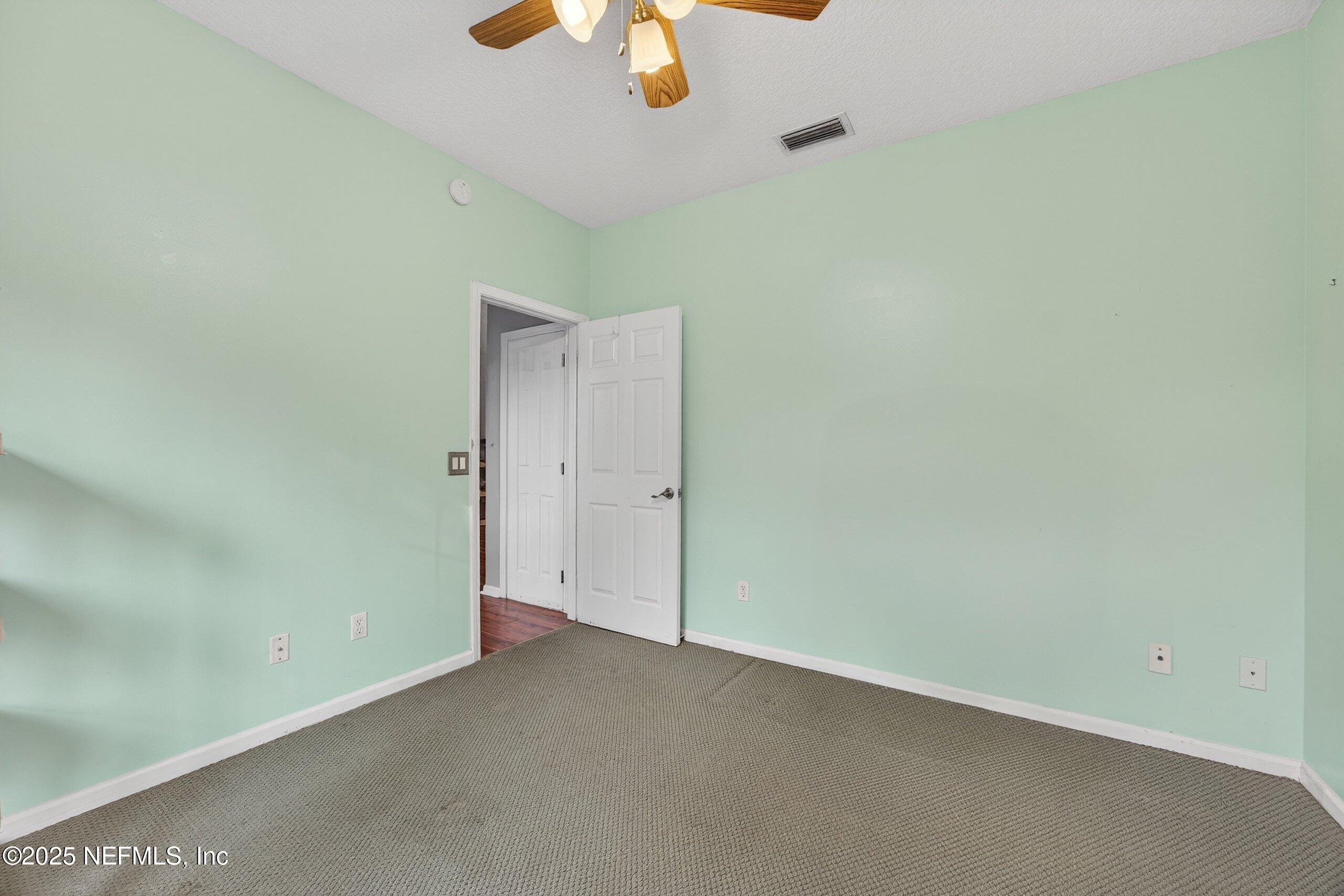 11319 Simmons Road Jacksonville, FL 32218 - Photo 18 of 32 a view of an empty room