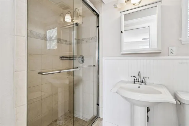 a front view of a house with a patio