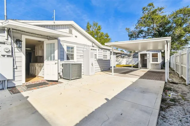 a view of the house with swimming pool