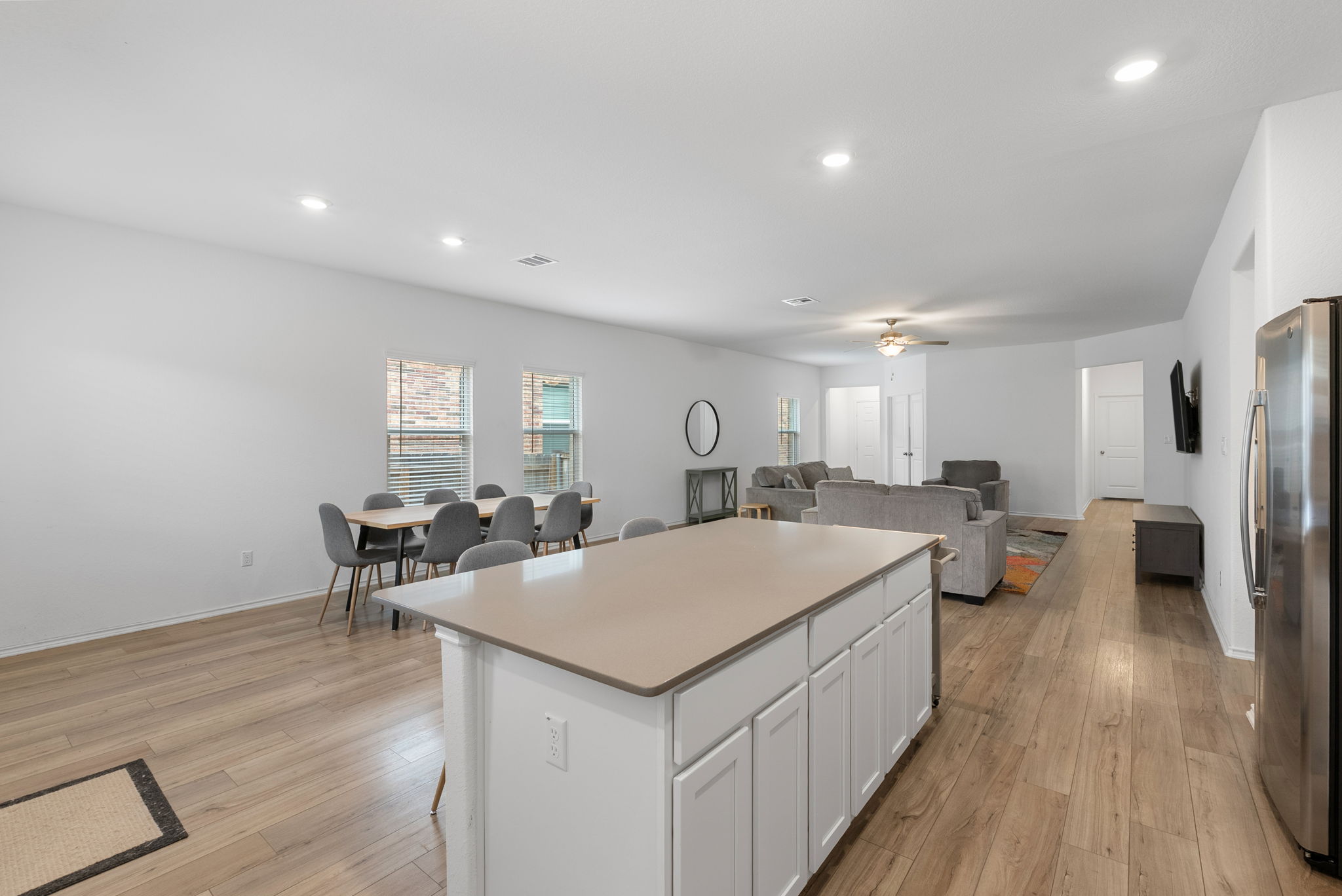 1240 Sweetspire Street Leander, TX 78641 - Photo 40 of 40 a view of a kitchen wooden floor and chairs