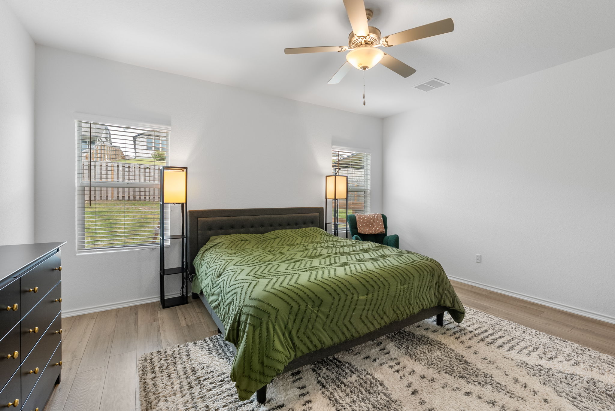 1240 Sweetspire Street Leander, TX 78641 - Photo 17 of 40 a bedroom with a bed and a window